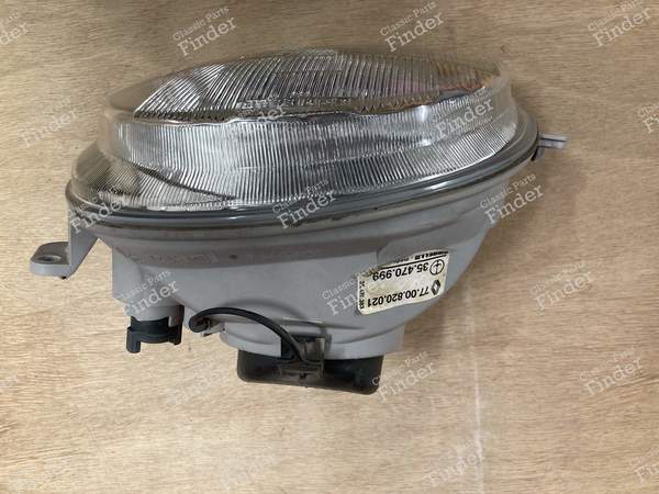 Left headlight optics phase 1 - RENAULT Twingo I - 7700820021 / 35470999- 2