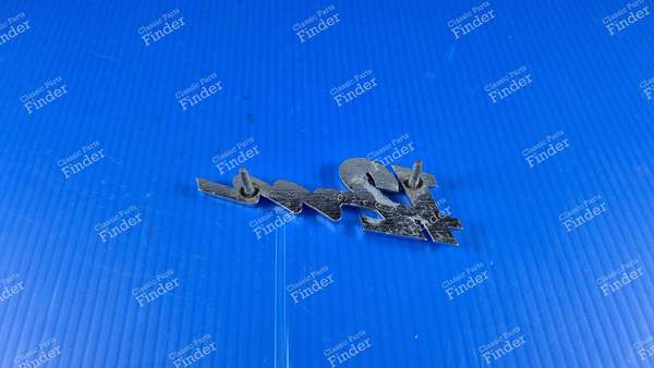 Sigle insigne arrière '12M' - FORD Taunus 12M (P6) - 2