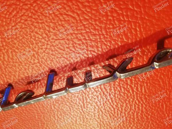 Deluxe' trunk sign - FORD Anglia 105E / Torino - 2